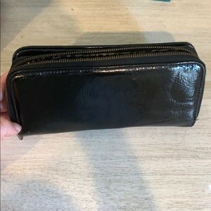 Black wallet with leopard print detail